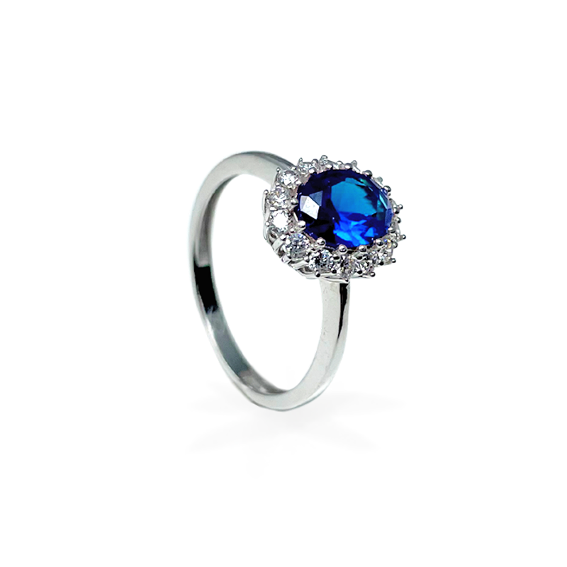 Anello in Oro Bianco con Gemma Blu e Punti Luce - Oro18kt